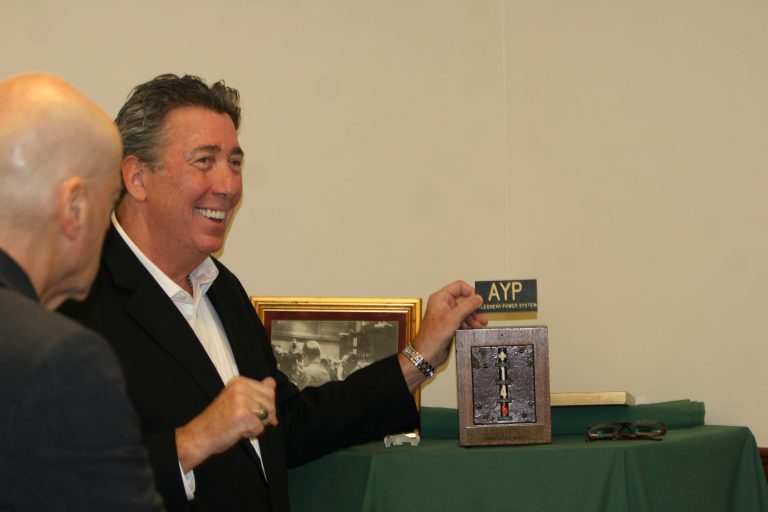 LIU Post Alumnus Gifts Antique NYSE Sales Indicator to College of Management